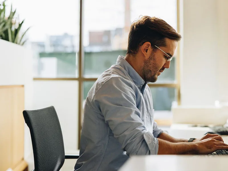 Businessman working computer in office